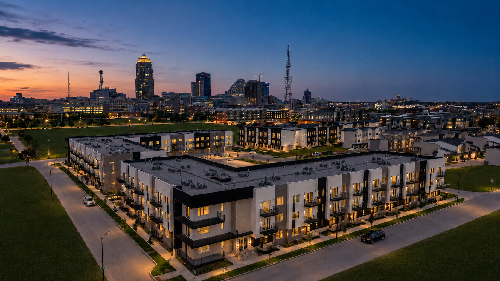 Downtown Des Moines townhome community at dusk